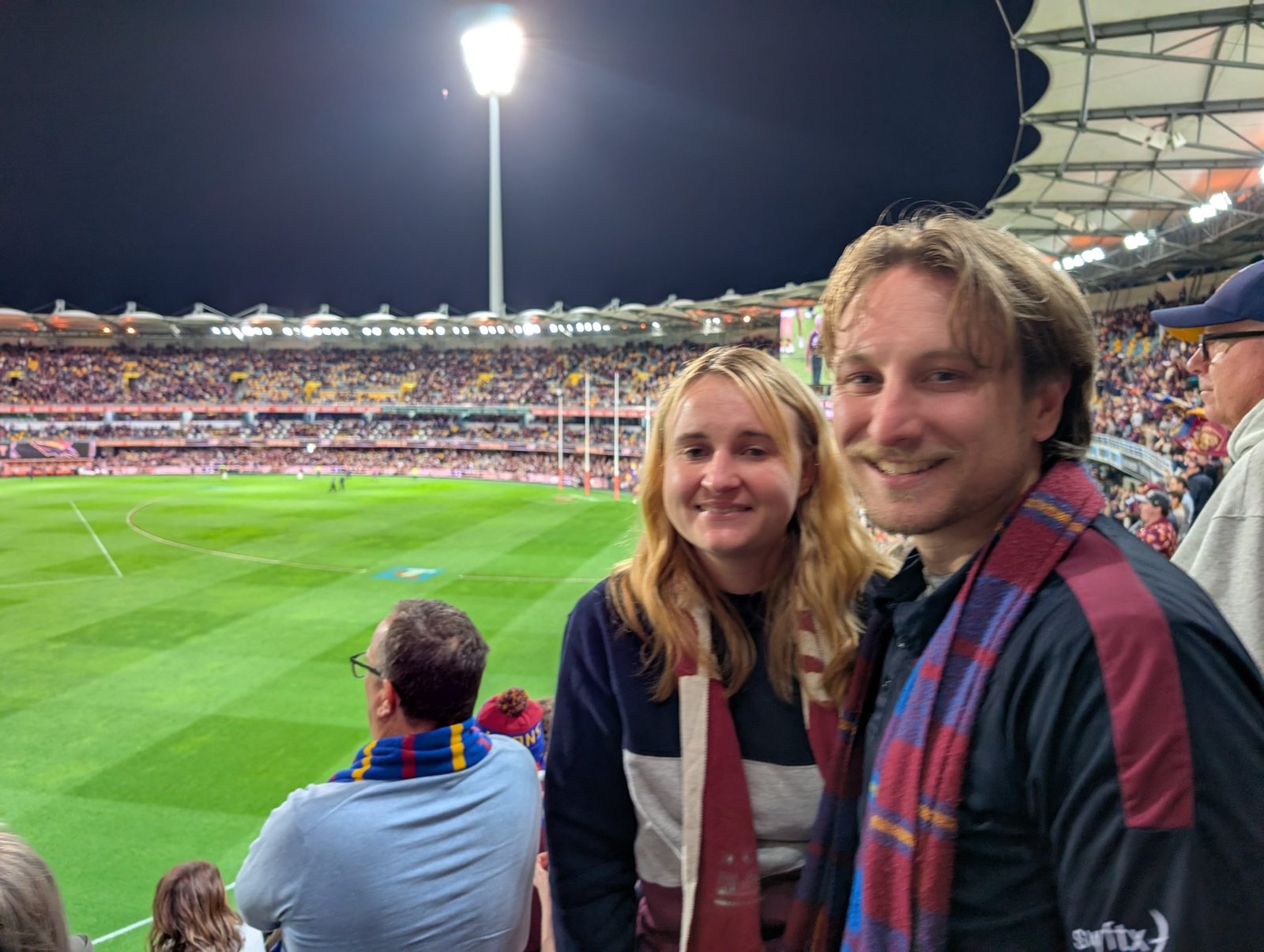 Maggie and Jack at a night football game